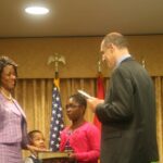 Ms. Goddette being sworn in as Mission Director to Guinea and Sierra Leone