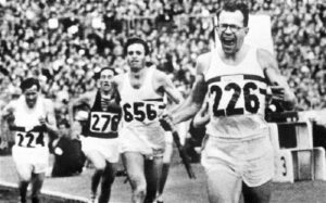 Chris Brasher wins the gold medal for the 3000 Metres Steeplechase at the 1956 Olympic Games in Melbourne, Australia