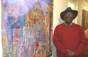Guyanese artist Dudley Charles with one of his creations