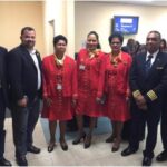 Minister David Patterson, Caribbean American Passport Publisher, Sam Roberts with the Surinam Airways Flight Crew