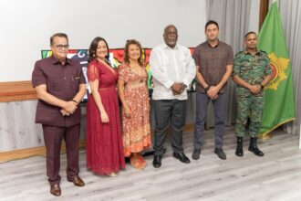 L-R: Gerrald Gouveia, Tina DaSilva, Jennifer DaSilva, Prime Minister Brigadier (Ret'd), Mark Phillips, Roland DaSilva Jr., Chief of Staff of the Guyana Defence Force, Brigadier Omar Khan